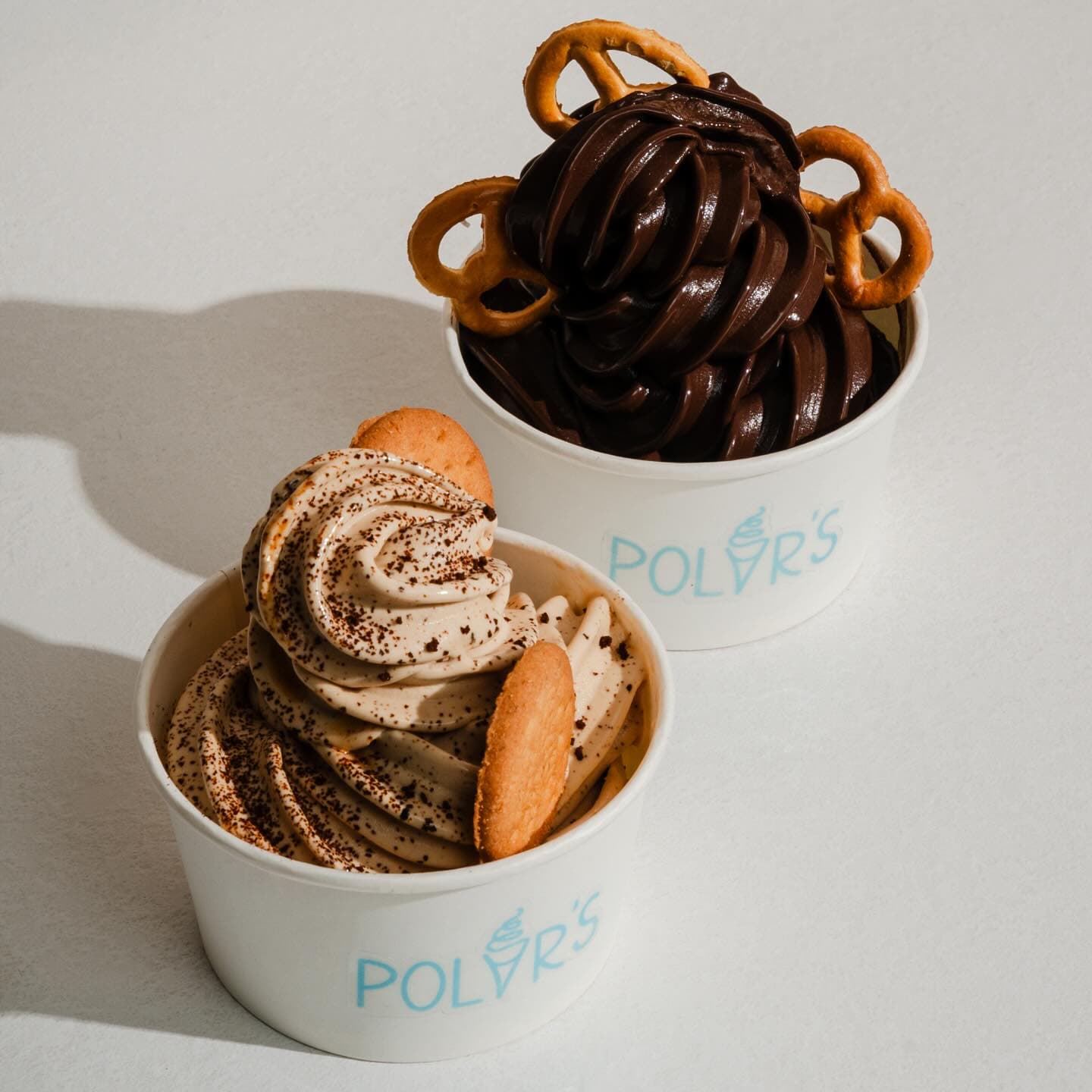 Two ice cream cups